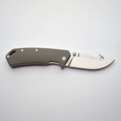 Couteau Chasse Pliant 8 Cm Gut Hook Vert Axis 80 5 Couteau Chasse Pliant 8 Cm Gut Hook Vert Axis 80 -Camping Randonnée Magasin couteau chasse pliant 8 cm gut hook vert axis 80 3